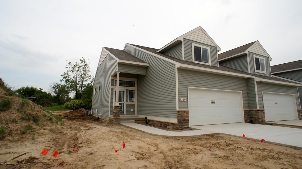 1219 Kingman Ct SW unit 55, Byron Center, MI 49315 - photo 1