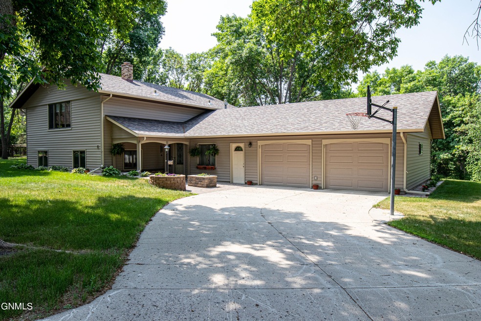 2104 3rd St NE, Jamestown, ND 58401 - photo 1