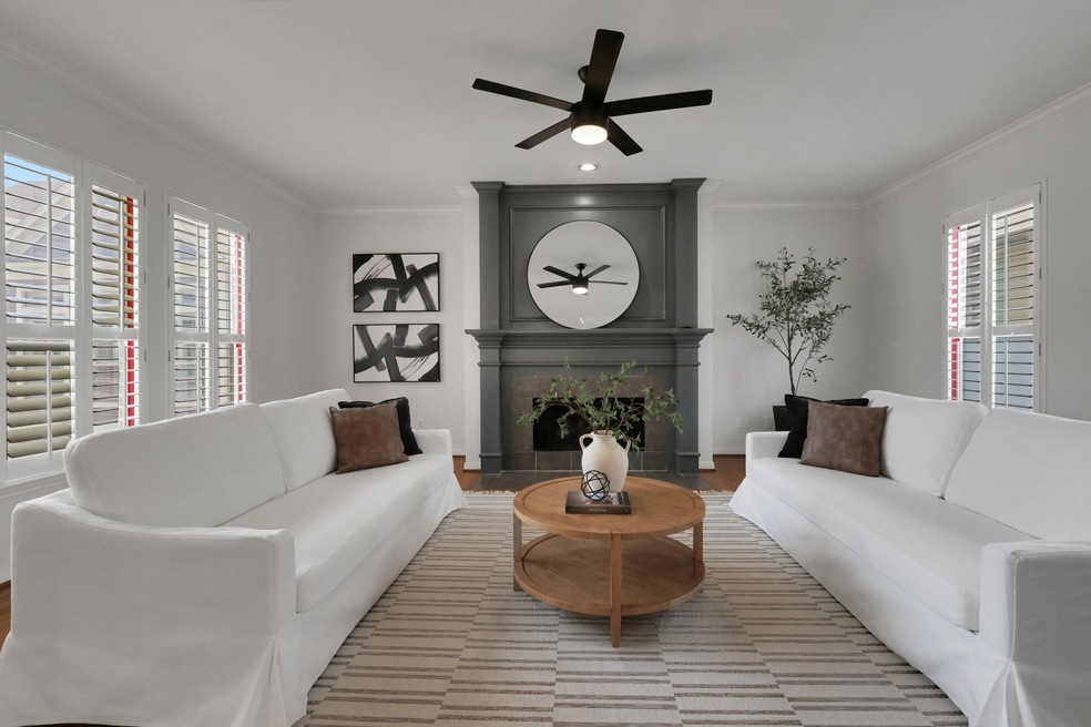 Bathed in natural light, the spacious living room