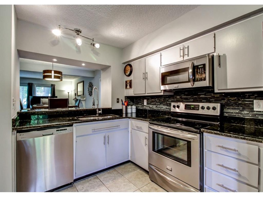 Updated kitchen features stainless steel appliance