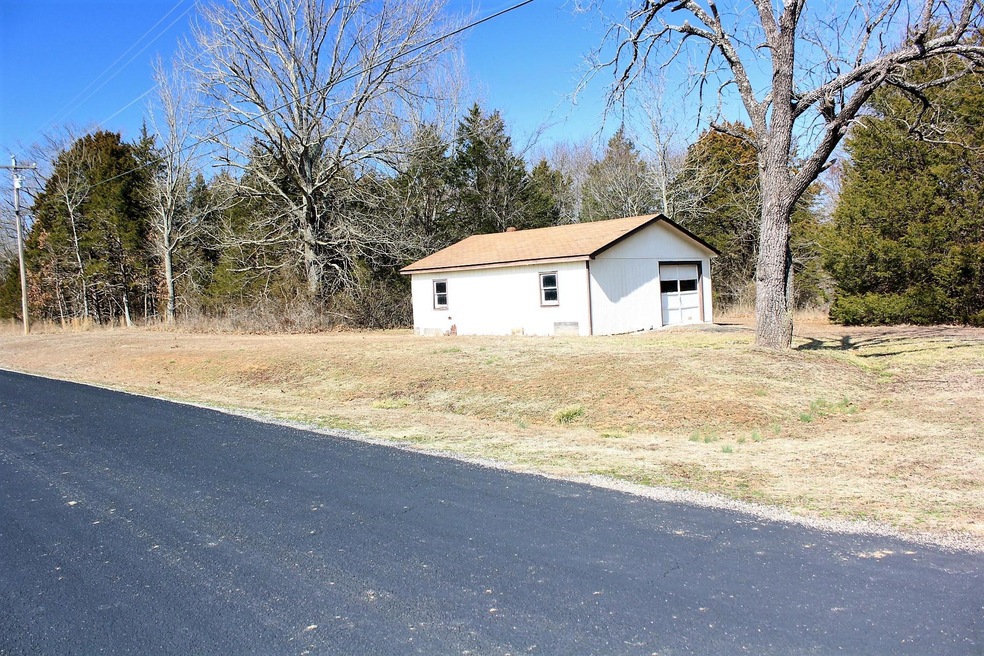 Roadfront Lot & Garage
