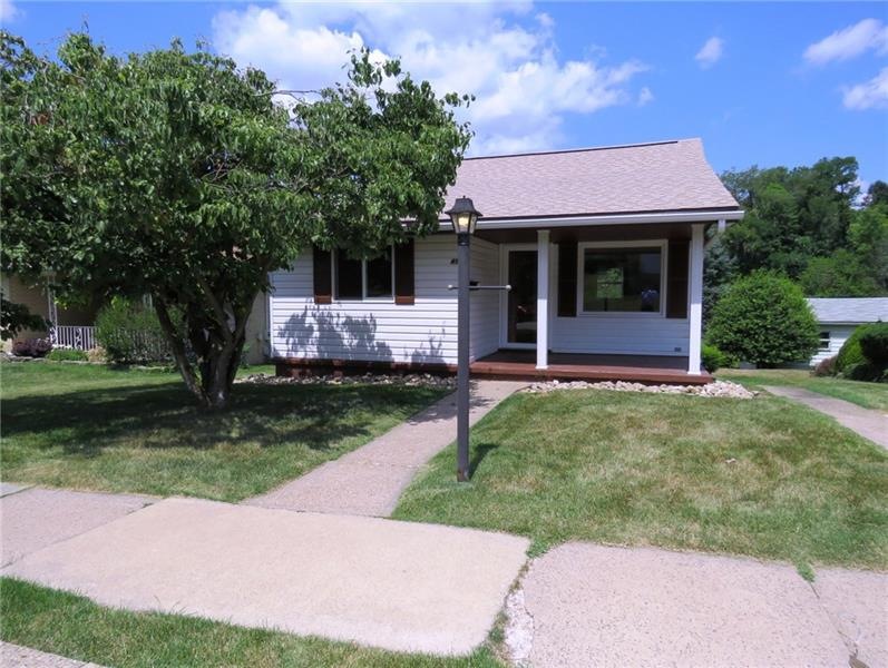 Nicely landscaped, 1 step ranch with many updates.