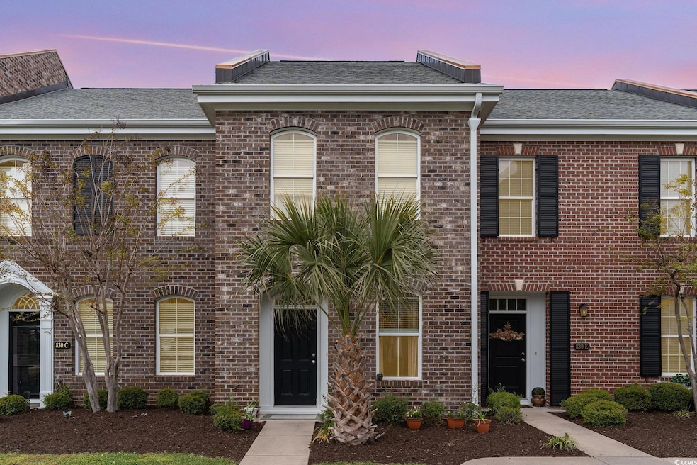 Multi unit property featuring a shingled roof and 