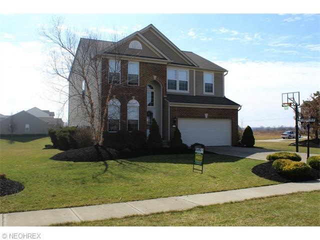Four bedroom brick front Pulte home.
