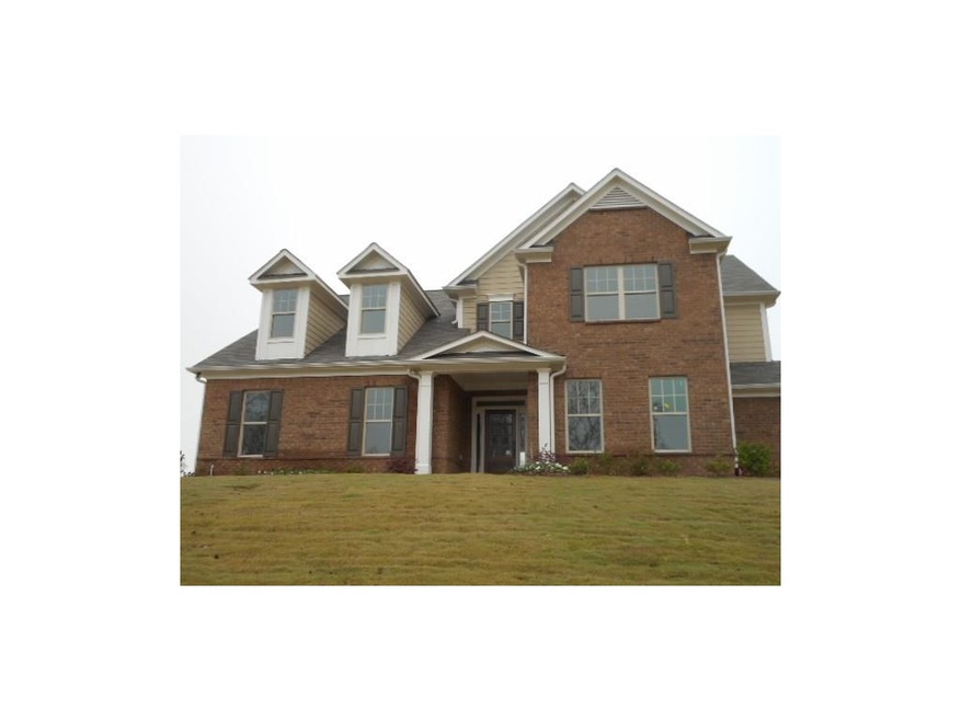 The Oakmont with classic brick/siding elevation