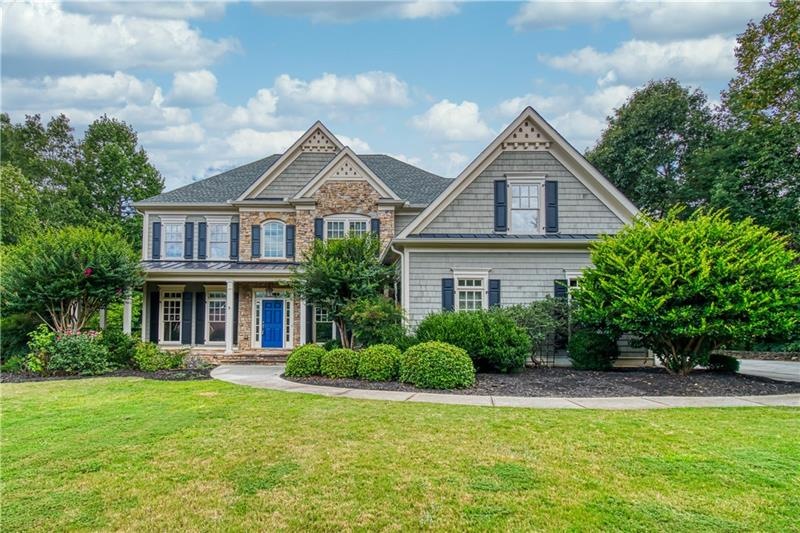 Stunning home situated on a private 1.62 acre wood