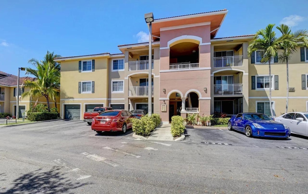 6565 Emerald Dunes Dr unit 301, West Palm Beach, FL 33411 - photo 1