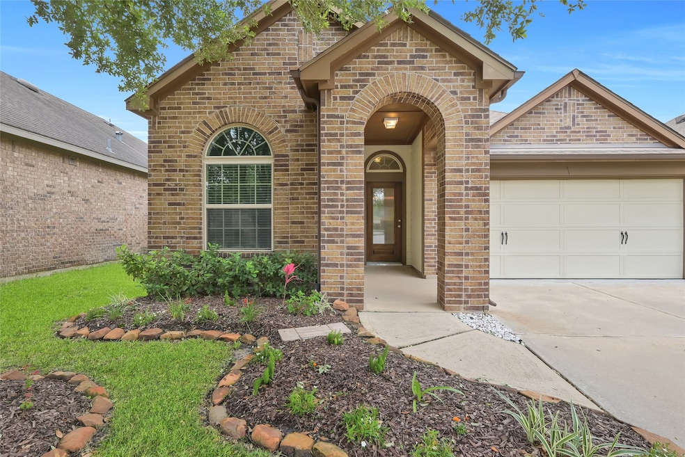 30923 Sundance Woods Ct, Spring, TX 77386 - photo 1