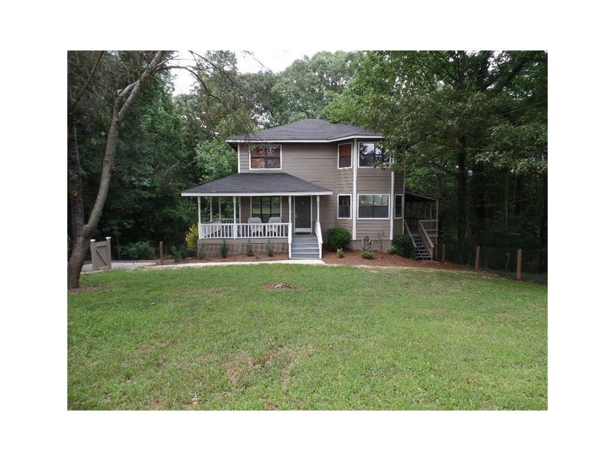 Two-Story Home with Rocking Chair Front Porch
