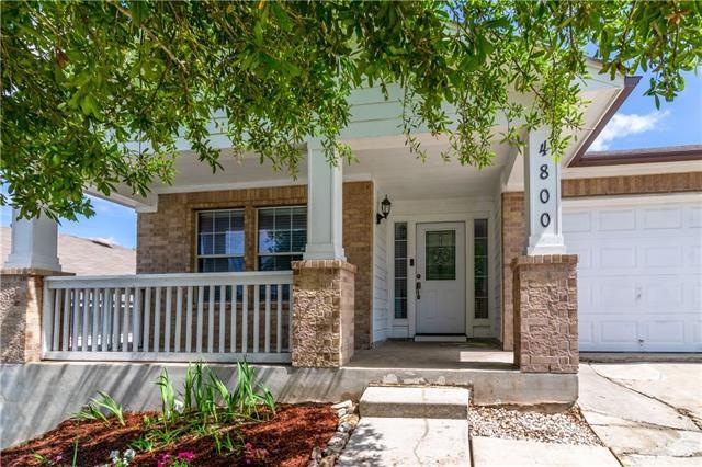 A large covered front porch greets you at 4800 For