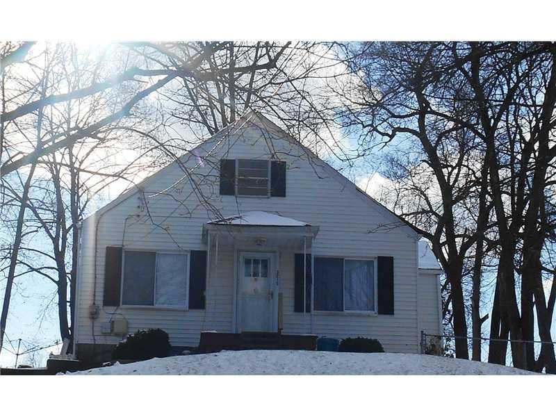 Exterior Front. Cottage style cape cod.