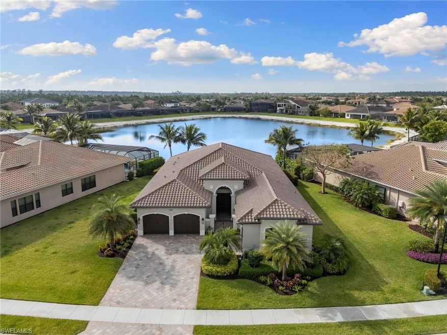 Aerial view of residential area with a nearby body of water