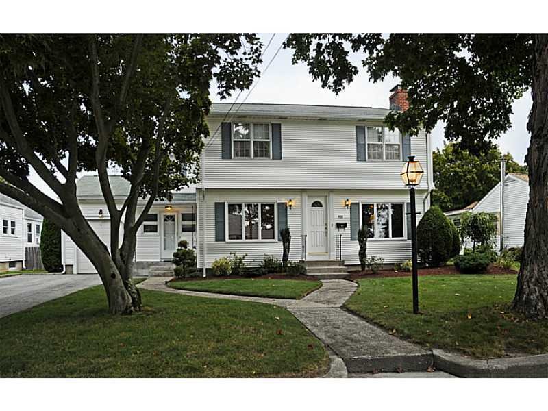 Exterior Front. Classic colonial with vinyl siding