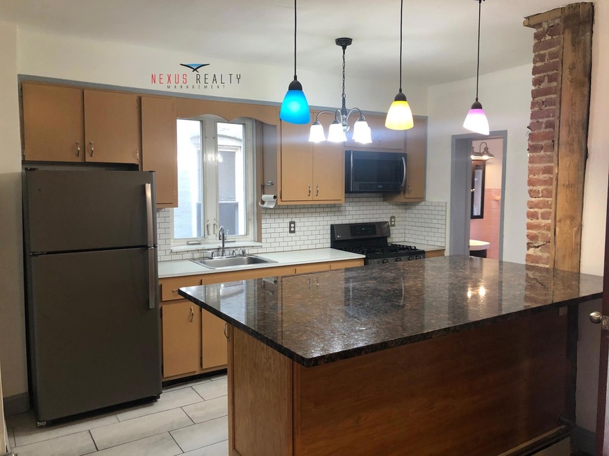 unlisted-address, Queens, NY 11105 - photo 1