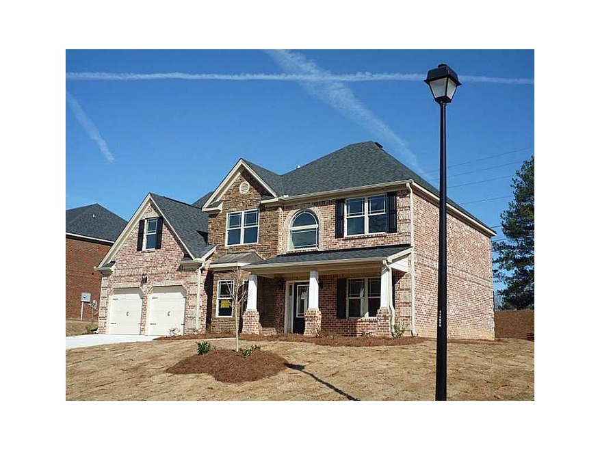 Exterior Front. 4 Sides Brick with  Stone and Fron