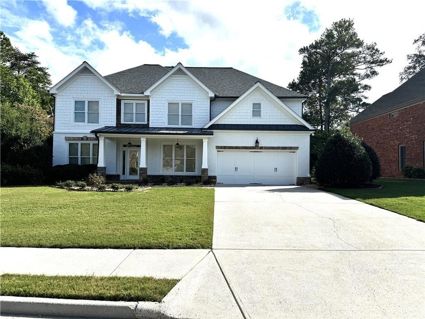 View of front of house featuring a front lawn