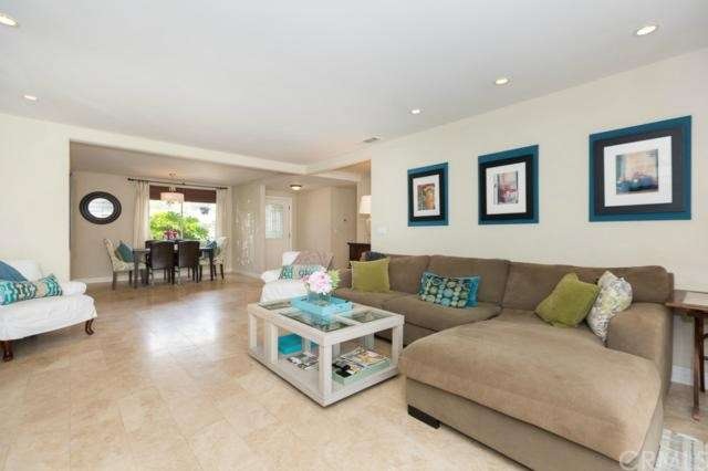 Travertine floors in main living areas, looking ba