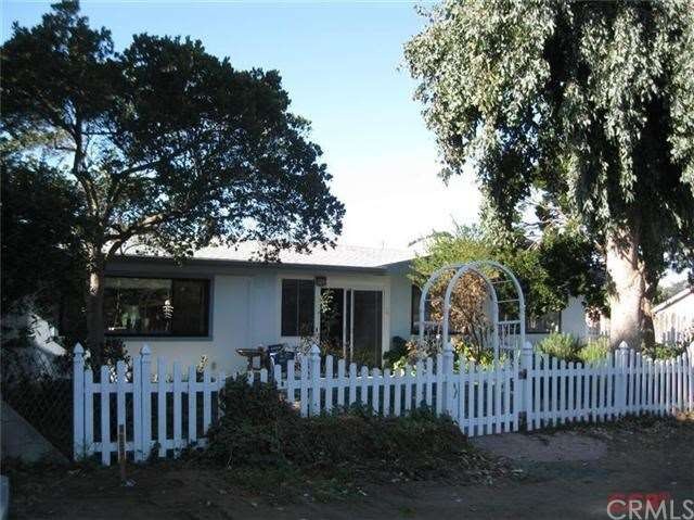 Street view of house. Wide area for parking cars b