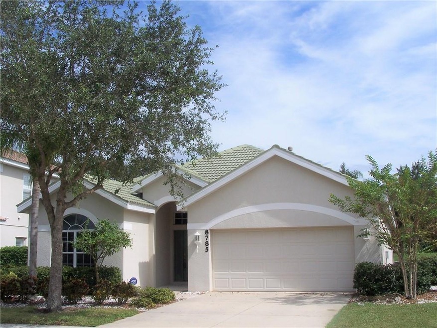 Front elevation with mature landscaping
