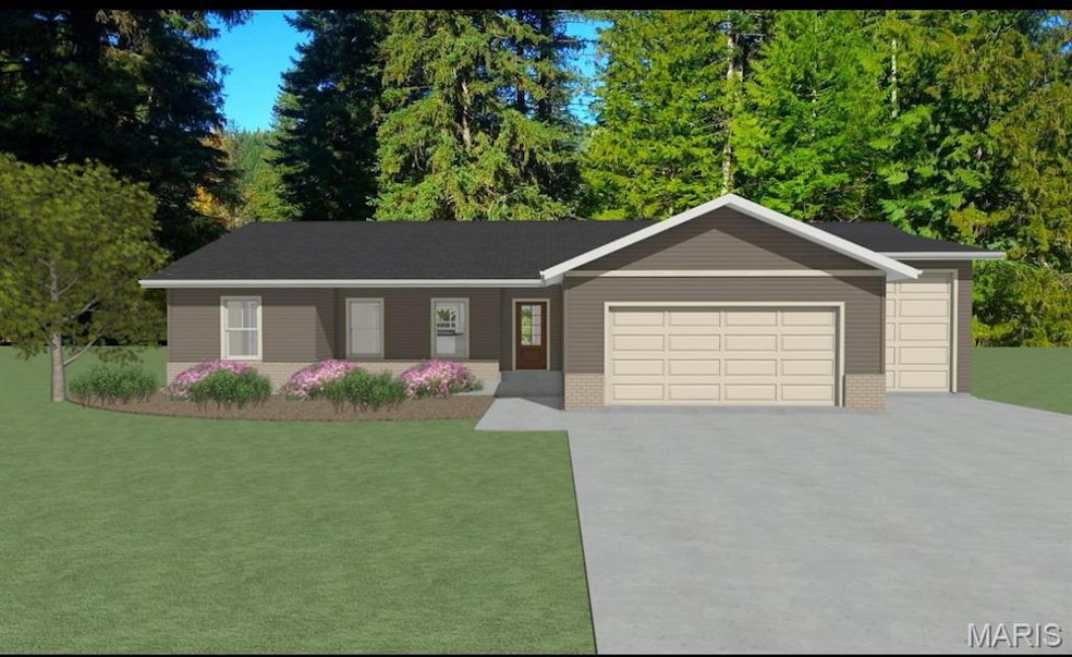 Ranch-style house featuring a garage, driveway, and a front lawn