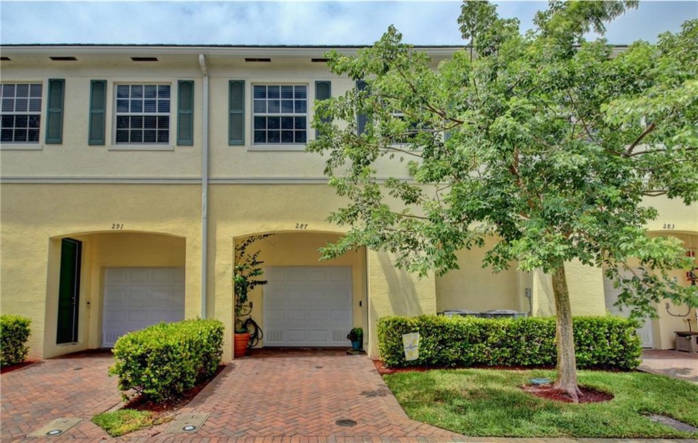 287 - Single car garage and entrance door on right