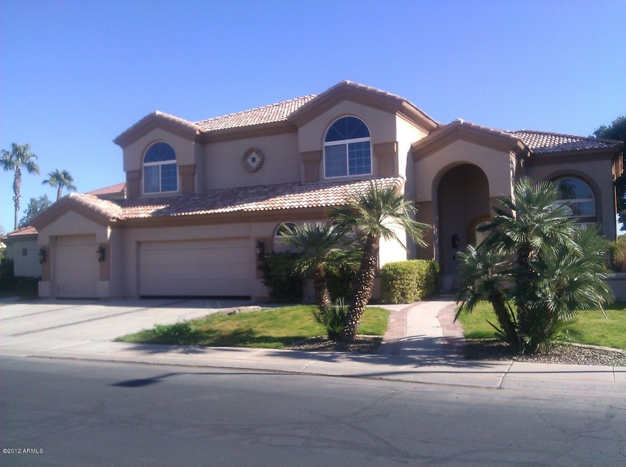 Val Vista Lakes Gated lake front Home