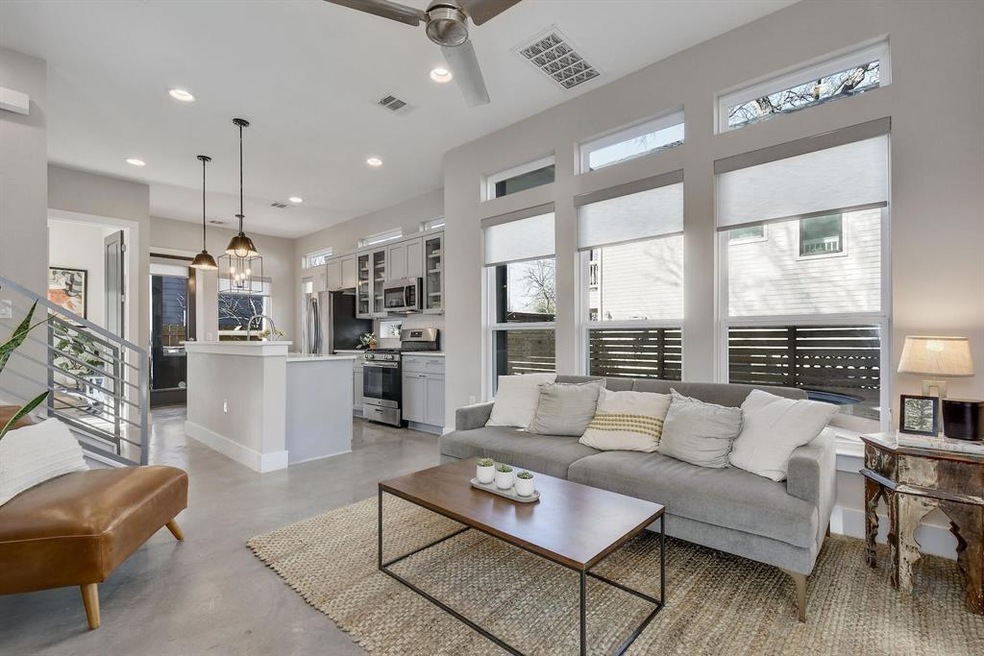 The 1,100 sq ft open concept interior is filled wi