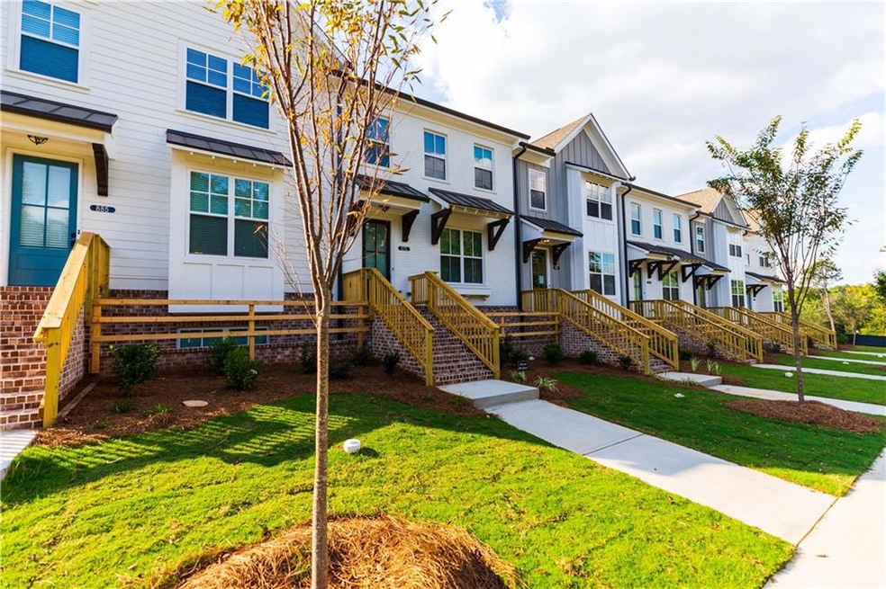Classic and stately townhome!  Photo is not of act