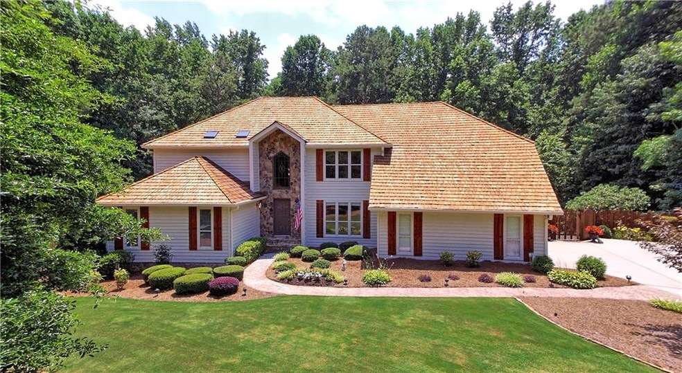 Beautiful architectural cedar shingle roof!