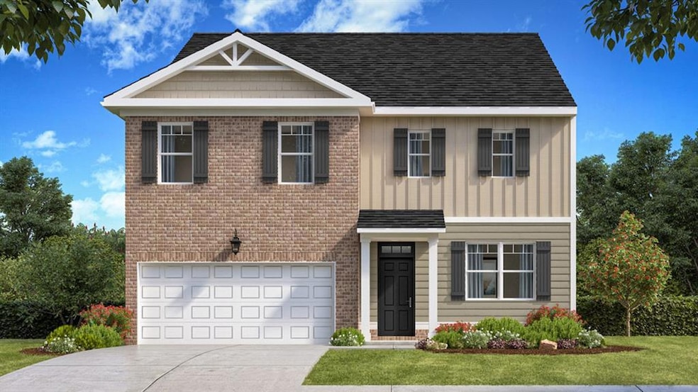 View of front of property featuring a front lawn a
