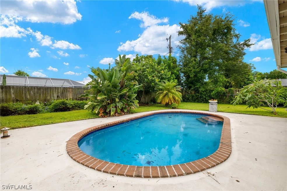 View of swimming pool with a lawn and a patio area
