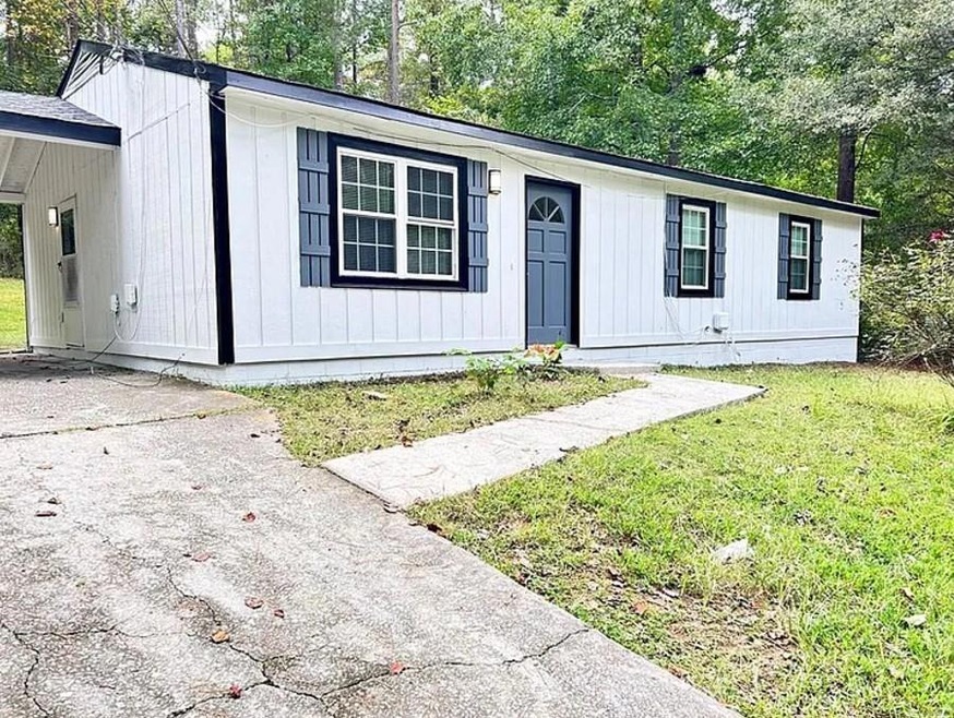 View of front of house with a front yard