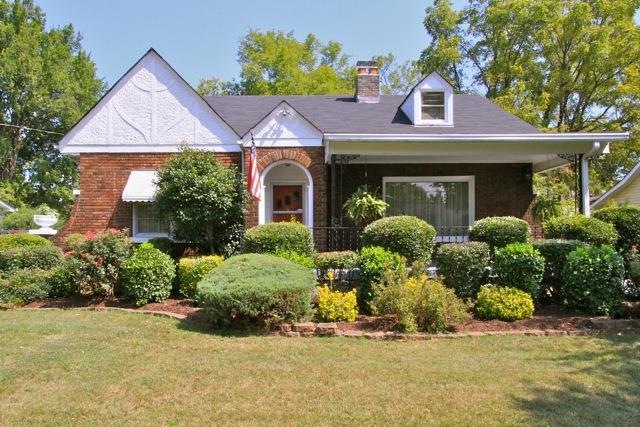Come home to this charming brick East Nashville Tu