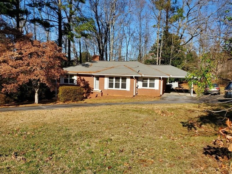 Great 4-sided brick ranch on acreage