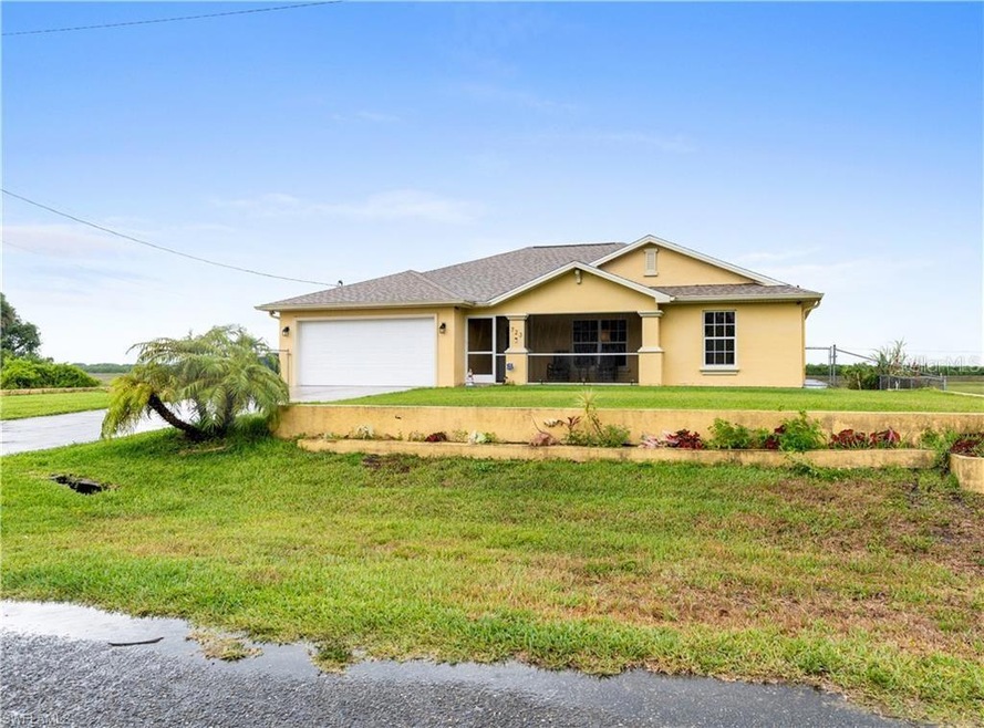 723 Naples Ave S, Lehigh Acres, FL 33974 - photo 1