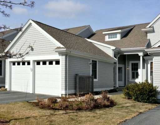 Exterior Front. Front of condo with 2 car garage
