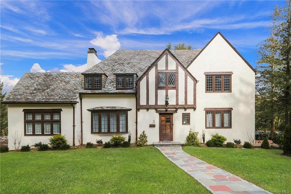 Stately, renovated Tudor on a beautiful .36 acre l