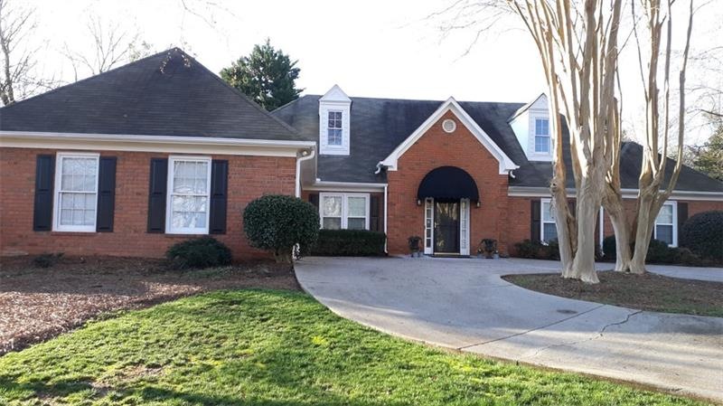Exceptional Brick Ranch in Prime Roswell! Circular
