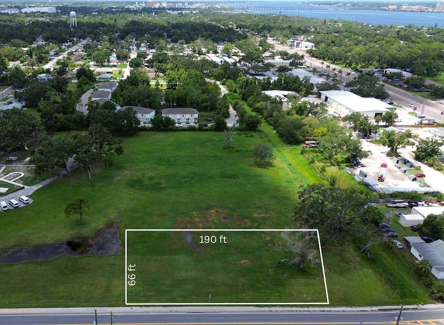 Sweeping shot facing West shows the lot’s proximity to commercial areas, key commuter routes, and even glimpses of the Manatee River and Bradenton skyline in the distance. Surrounded by established and emerging development, this lot represents a rare infill opportunity with no HOA and R-2 zoning already in place.