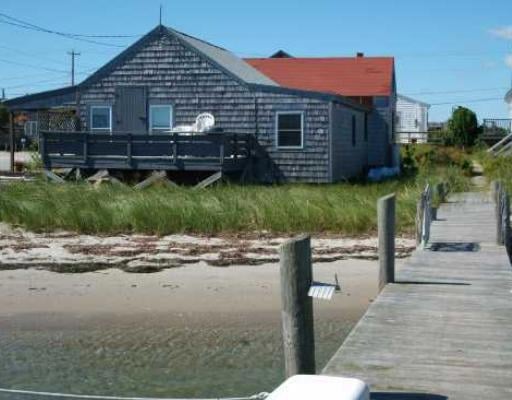 Exterior Front. Side view from the dock, overlooki