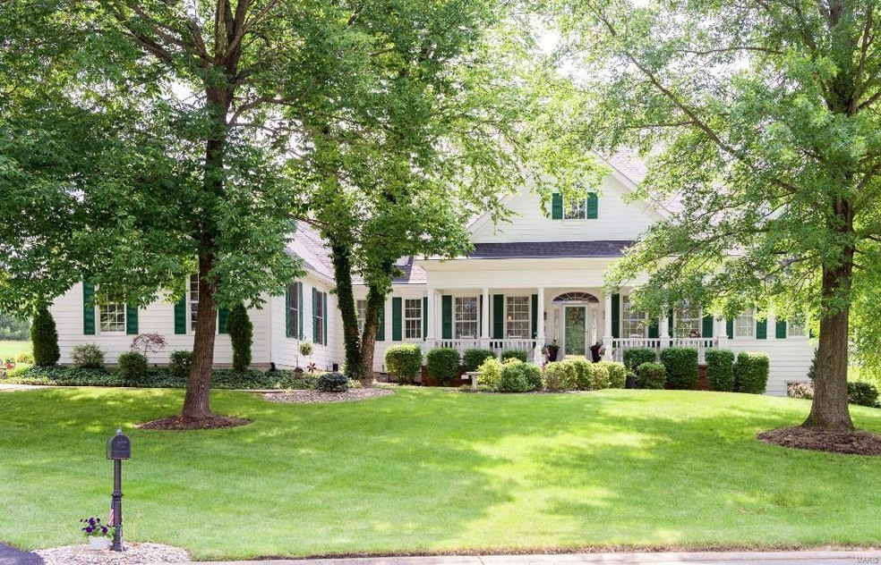 Southern Colonial with large covered porch and mat