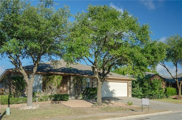 Front of Home with Mature Oak Trees and Xeroscape 