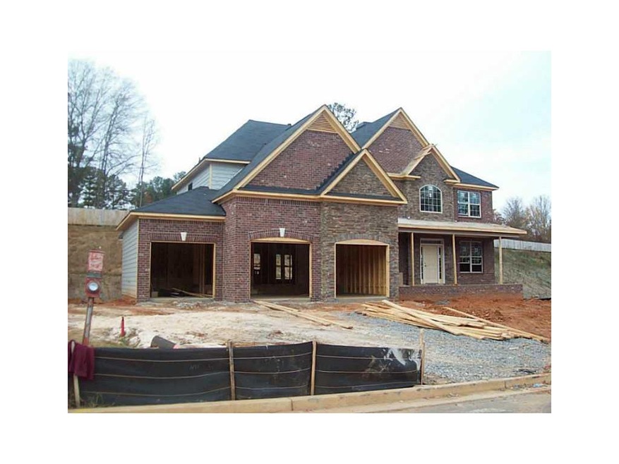 Exterior Front. ROSEHILL PLAN 3 CAR GARAGE KEEPING