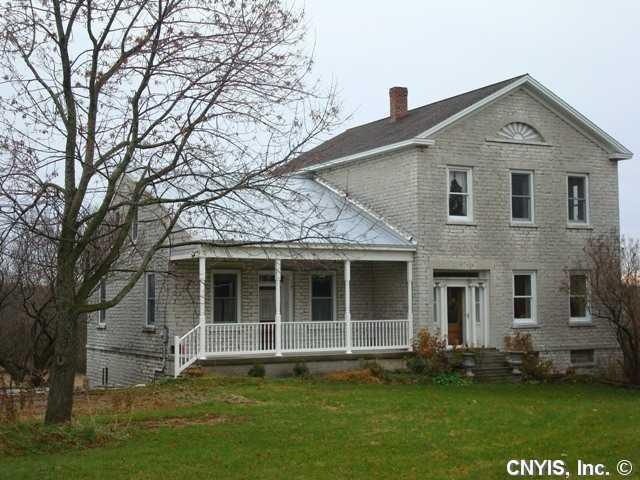 Exterior Front. Well kept home on 4 acres that you