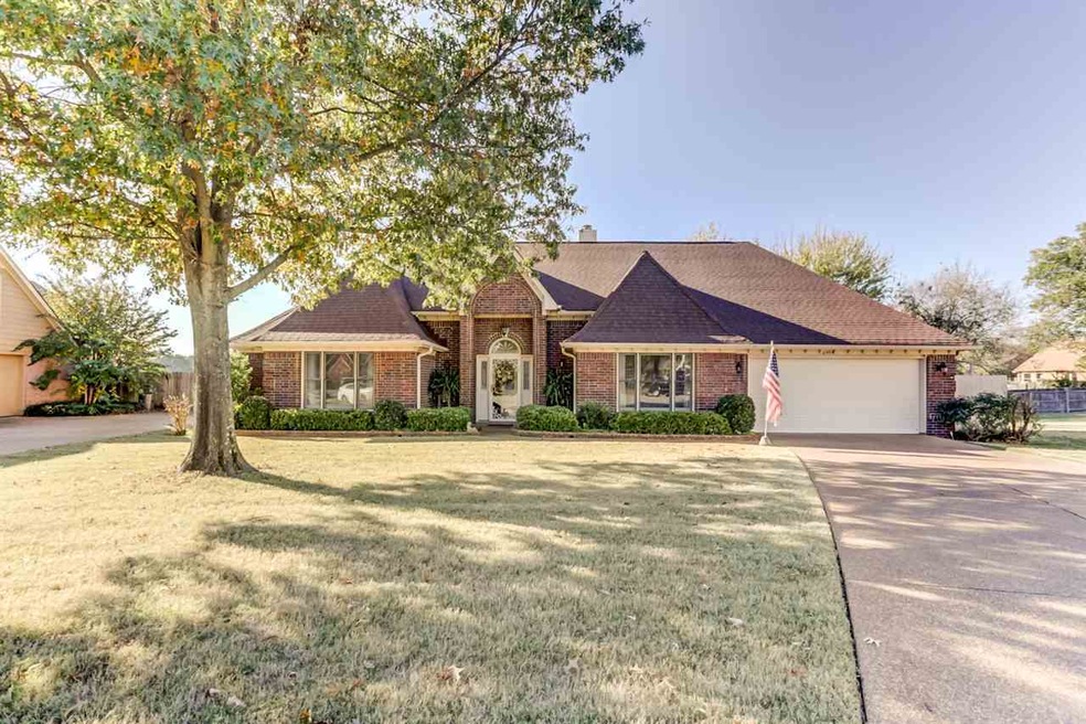 Welcome home to 8454 Cairn Creek Cove, an amazing 