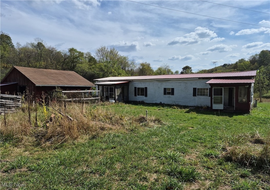 9256 Blossom Rd NE unit 15, Mechanicstown, OH 44651 - photo 1