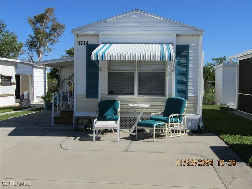 Back of property featuring a patio area