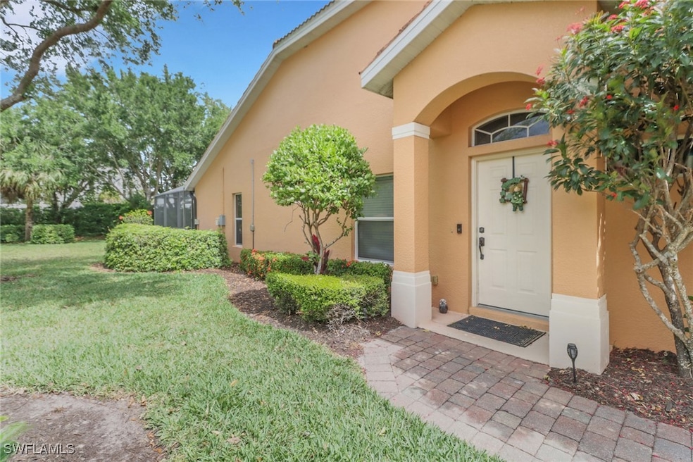 Private entrance to property featuring a brick pav