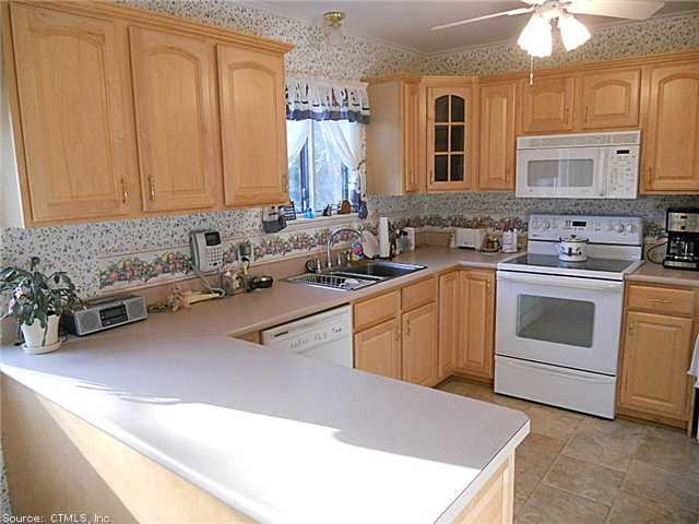 702 Heritage Village unit 702 B, Southbury, CT 06488 - photo 1