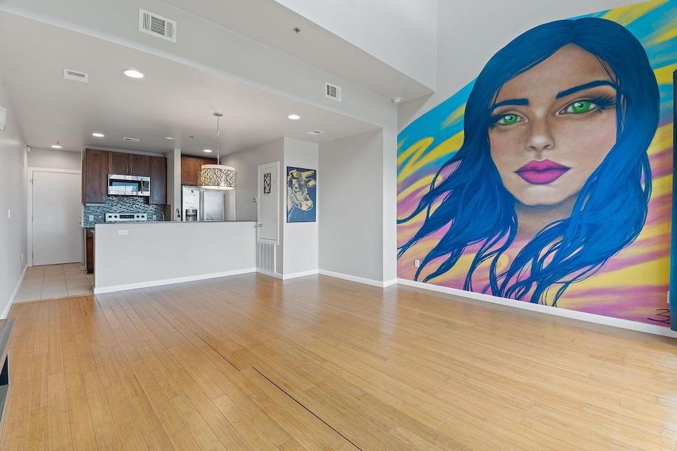 Unfurnished living room with baseboards, recessed